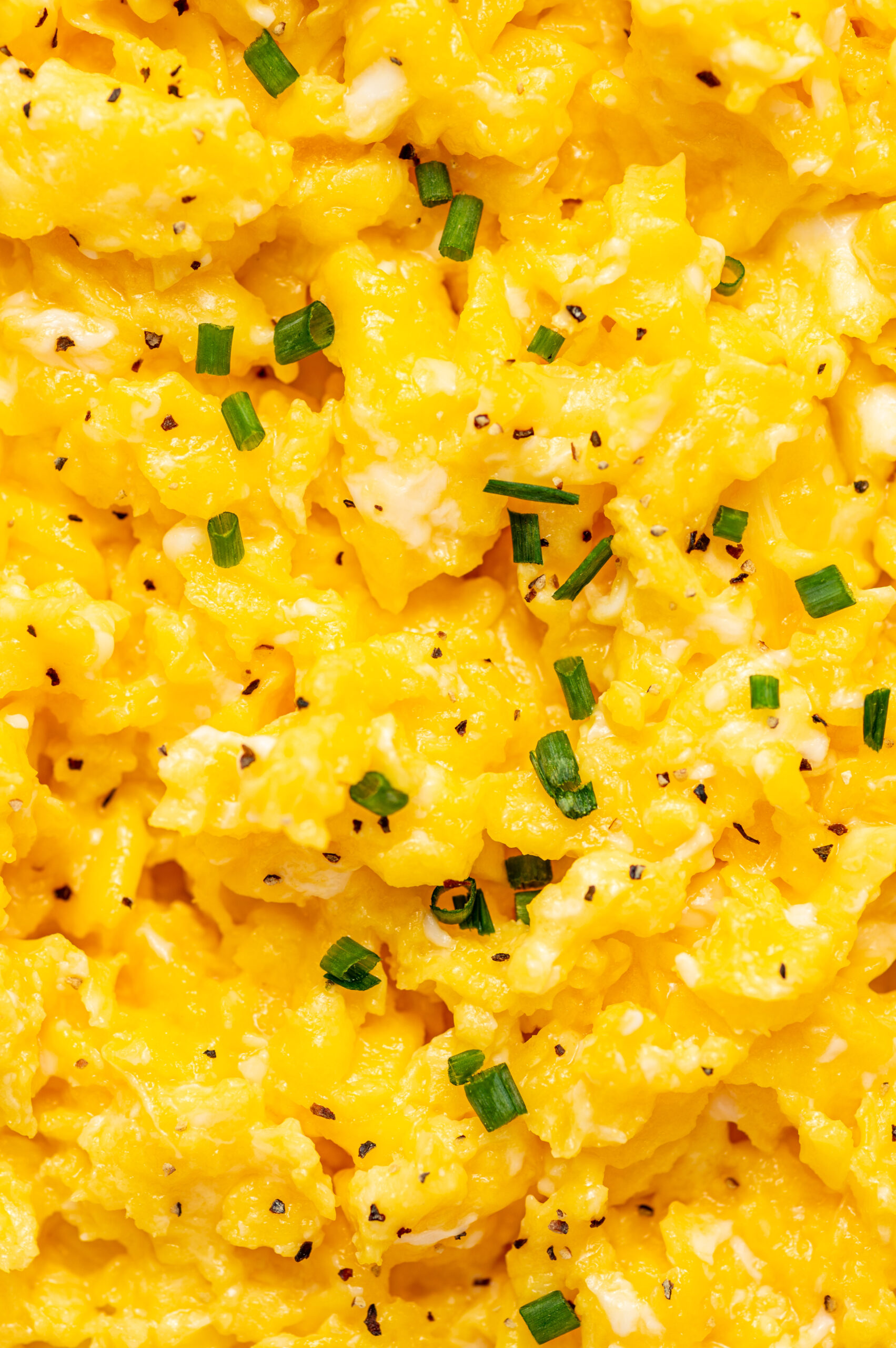 Close-up of perfectly fluffy A serving of restaurant-style scrambled eggs.