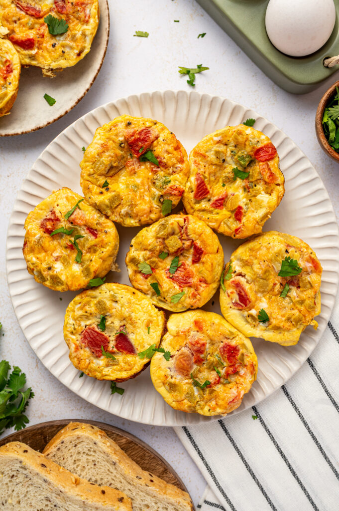 Southwest scrambled egg bites with tomatoes, peppers, and green chilies.