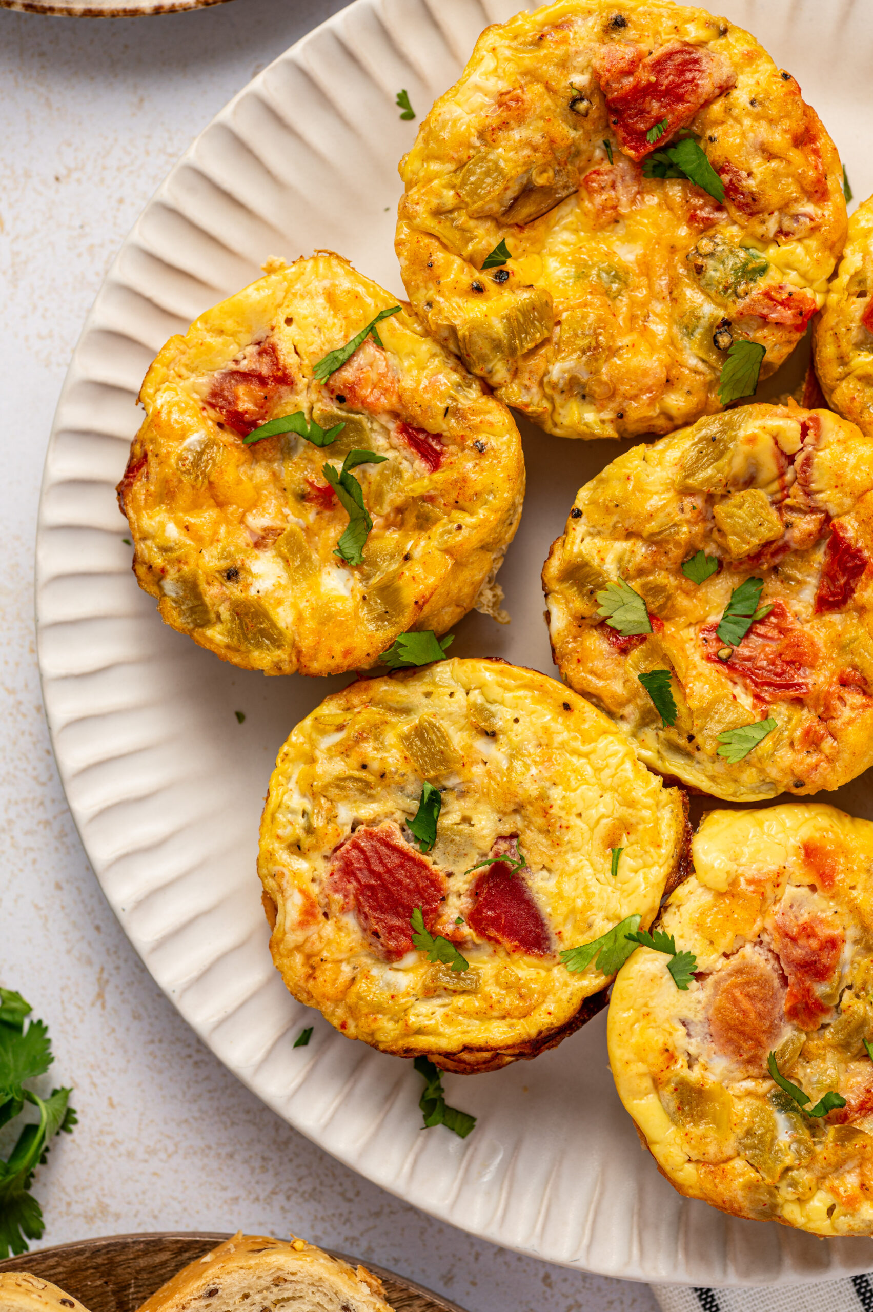 Delicious Southwest scrambled egg bites on a white plate.