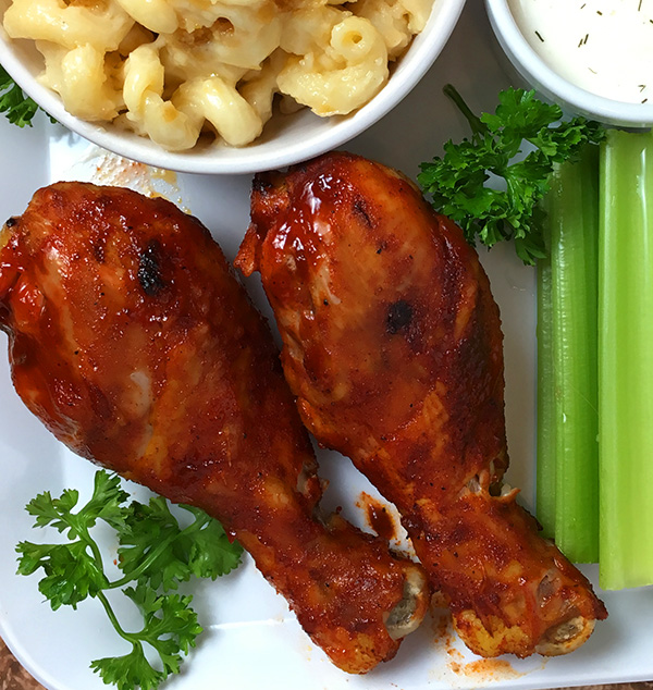 A plate of barbecue chicken legs made in an Instant Pot pressure cooker