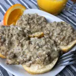 A plate of biscuits and homemade Instant Pot sausage gravy.