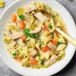 A bowl of chicken noodle soup that was made in an Instant Pot pressure cooker.