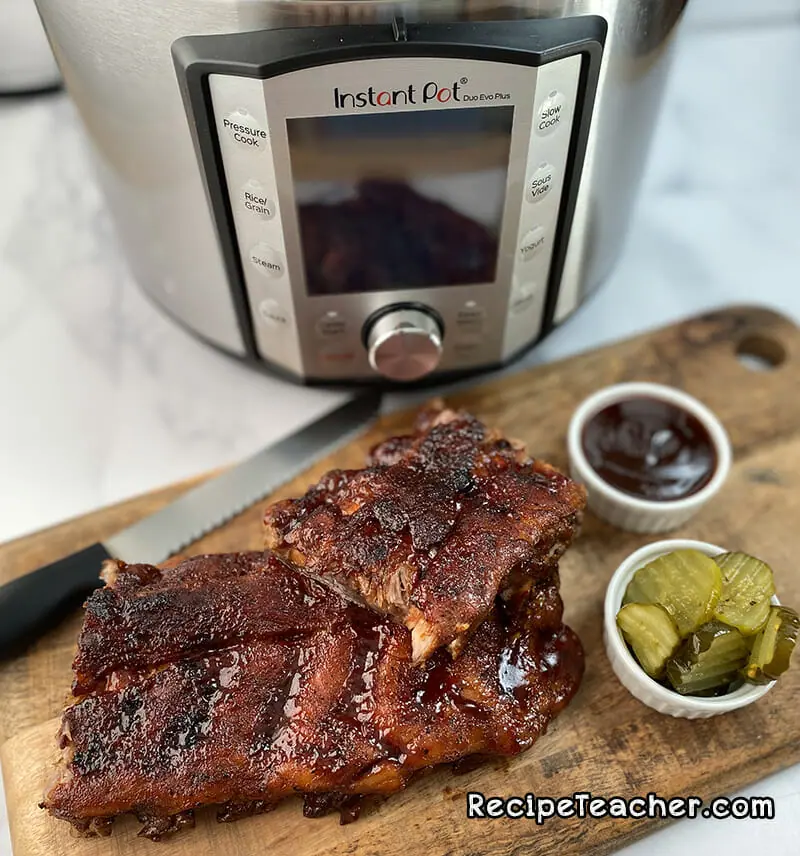 A slab of ribs cooked to perfection in an Instant Pot pressure cooker