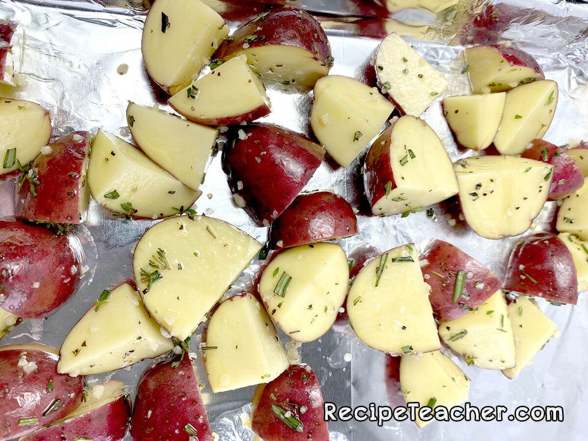 Sheet pan pork chops and baby red potatoes.