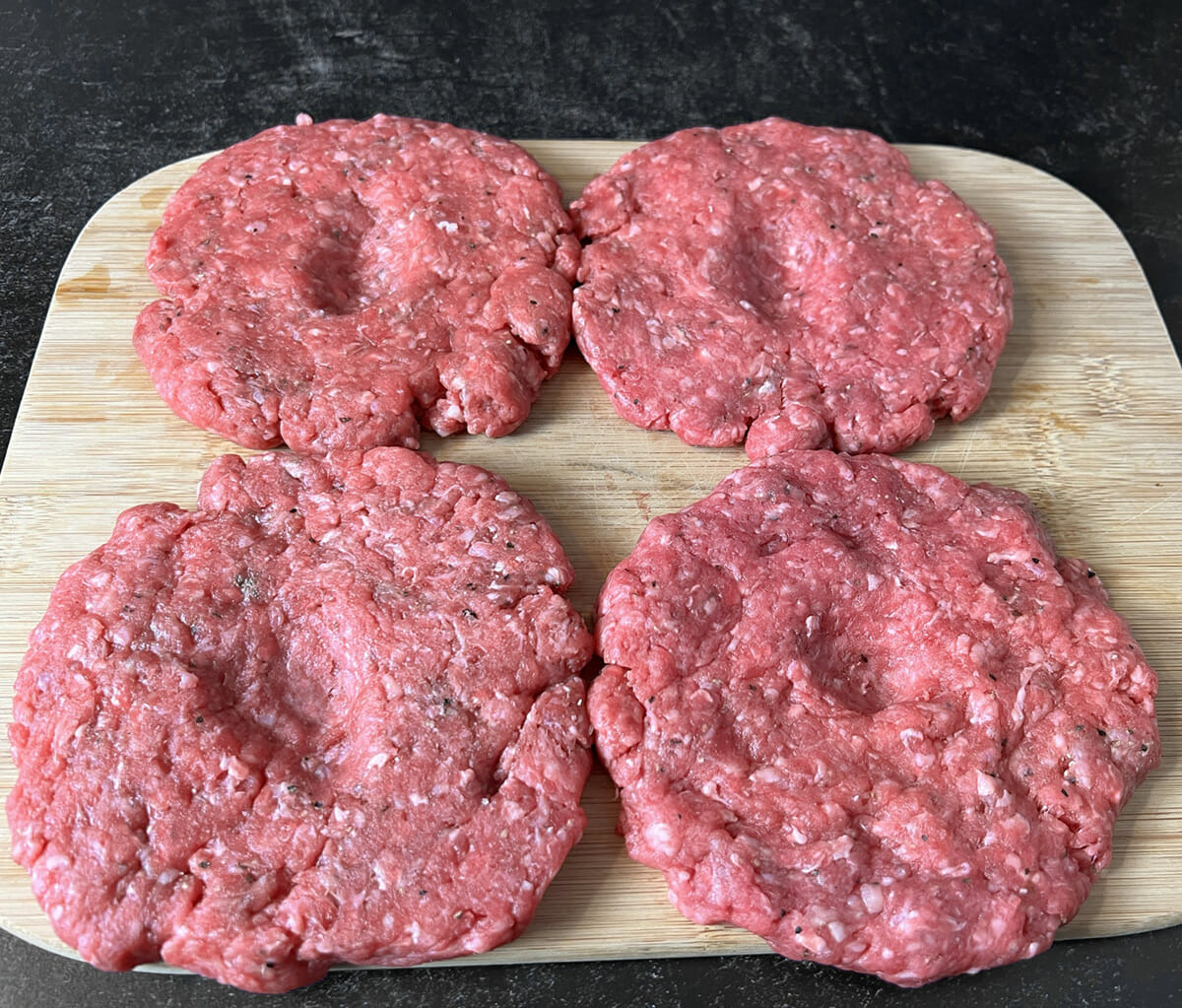 Hamburger patties ready to go in the air fryer