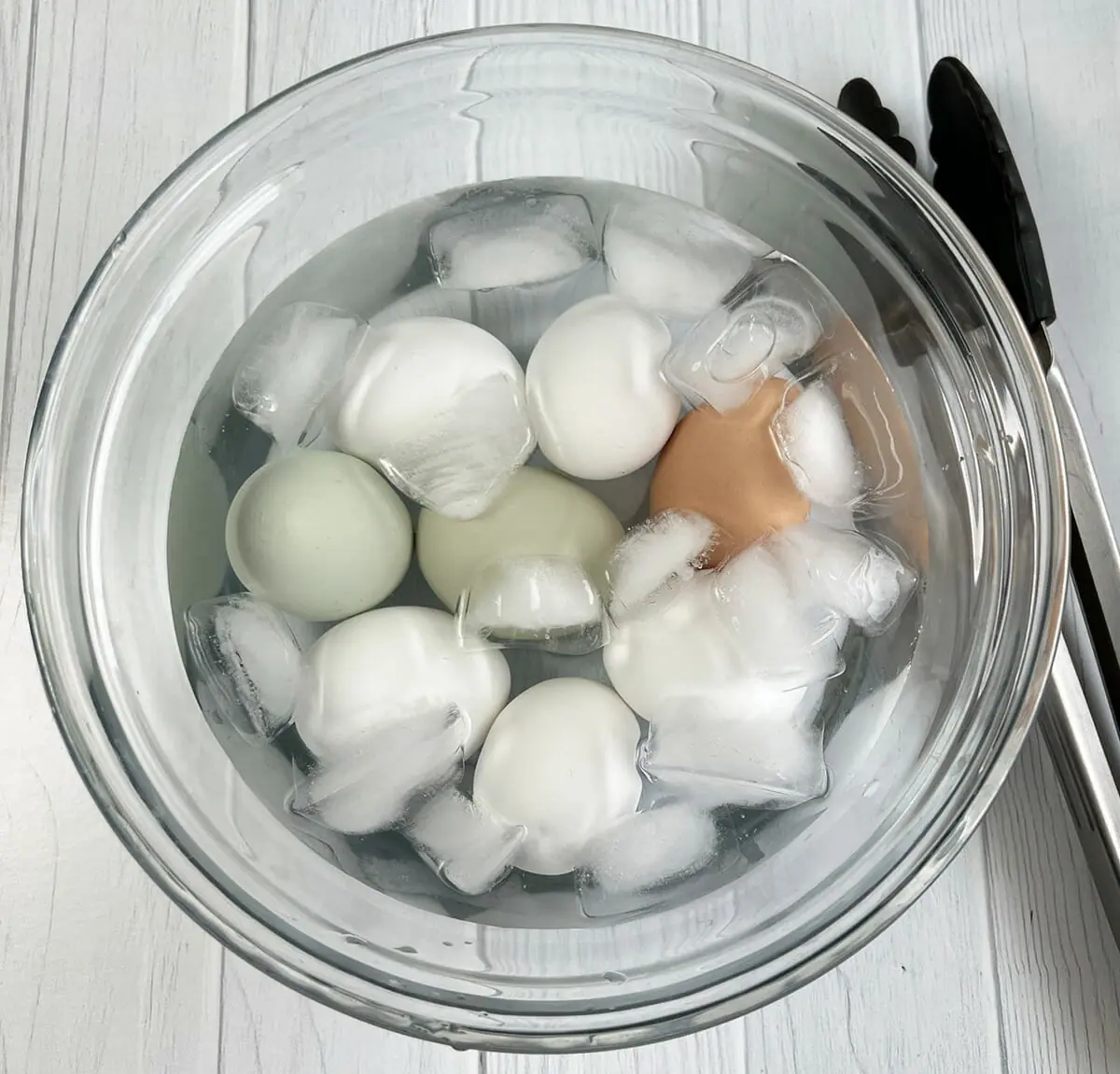 Cooling hard boiled eggs in an ice bath after cooking in an Instant Pot.
