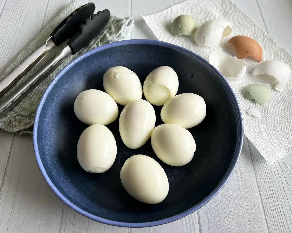 Peeling eggs that are hard boiled in an Instant Pot.