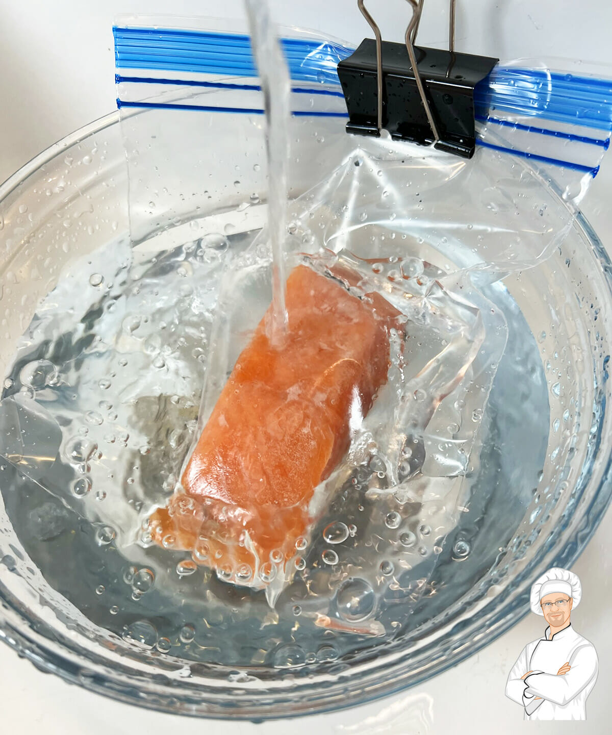 using the cold water method to defrost a salmon filet. 