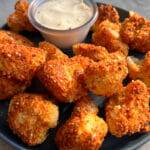 Breaded cauliflower parmesan bites with everything bagel seasoning.
