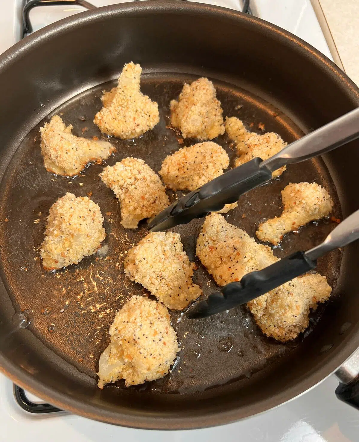 Frying breaded cauliflower bites