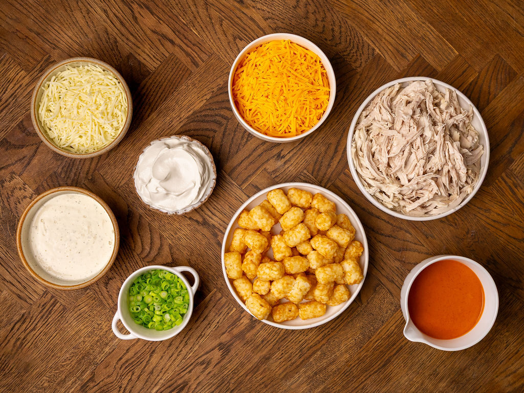 Ingredients for buffalo chicken tater tot casserole.