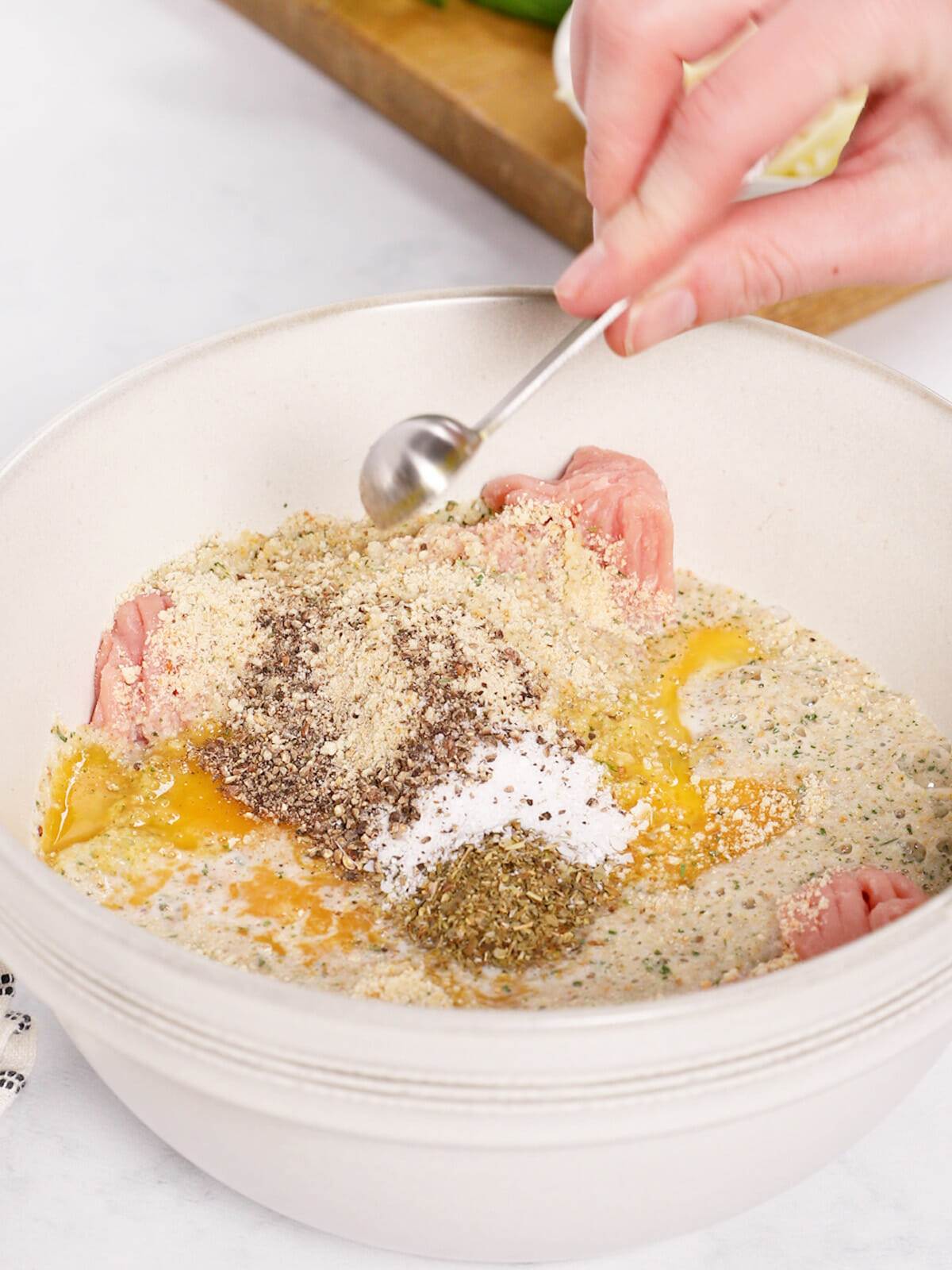 Mixing the ingredients to make our stuffed turkey meatloaf.