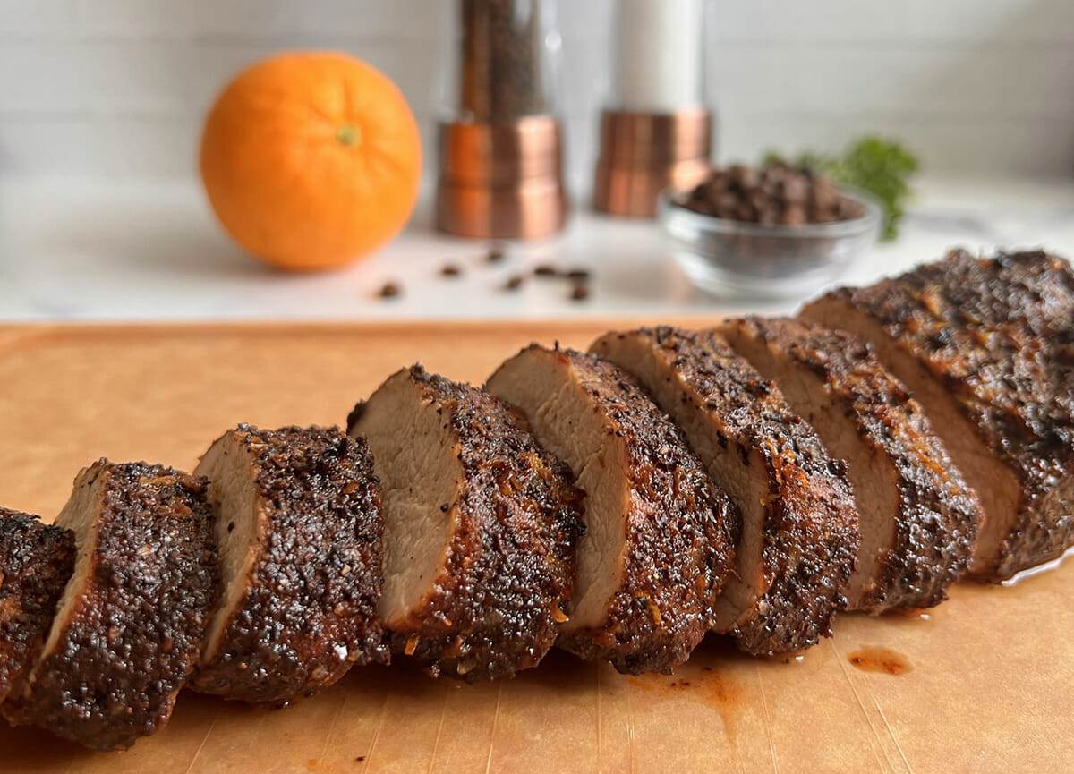 Cooked and sliced air fryer coffee-citrus pork tenderloin.