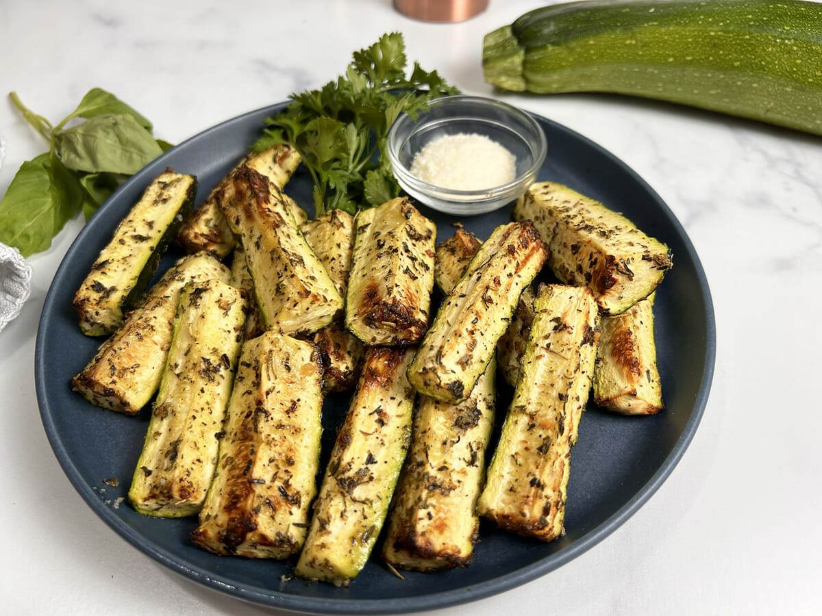 Roasted zucchini spears made in an air fryer.