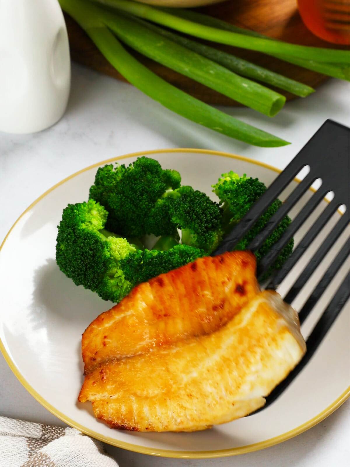 Serving our teriyaki glazed air fryer tilapia.