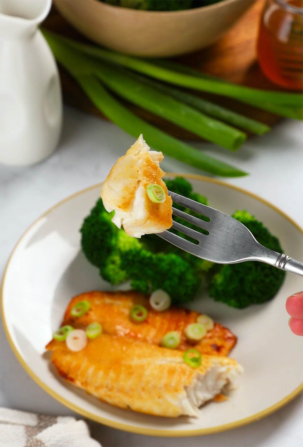 Air fryer tilapia in a fork.