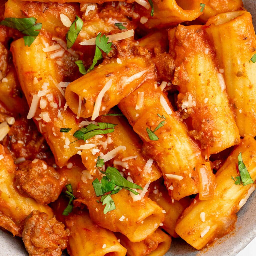 a pot of one-pot pasta with meat sauce.