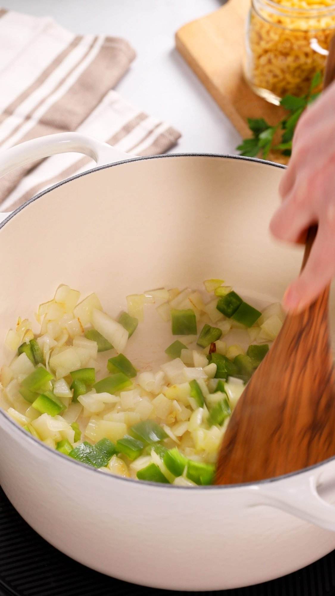 Sautéing onions and peppers for our recipe for American goulash.