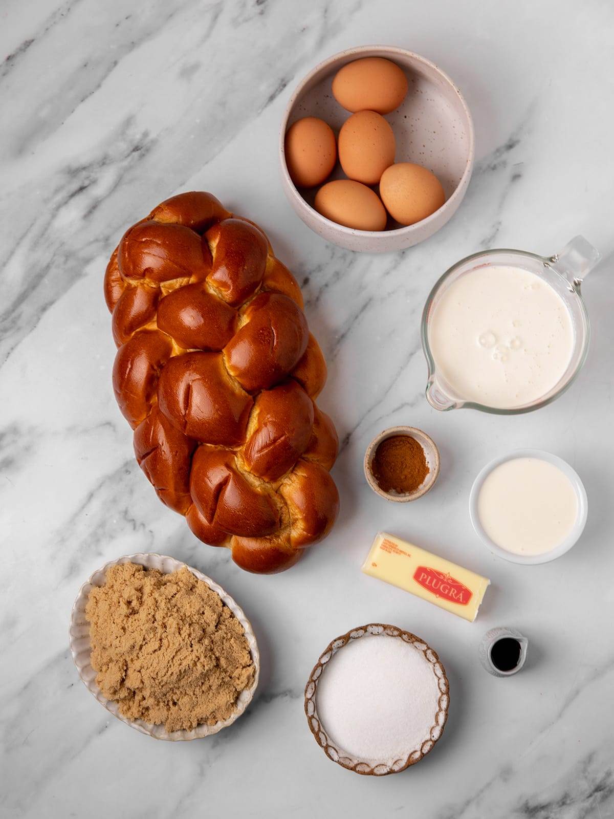 All the ingredients to make bread pudding.