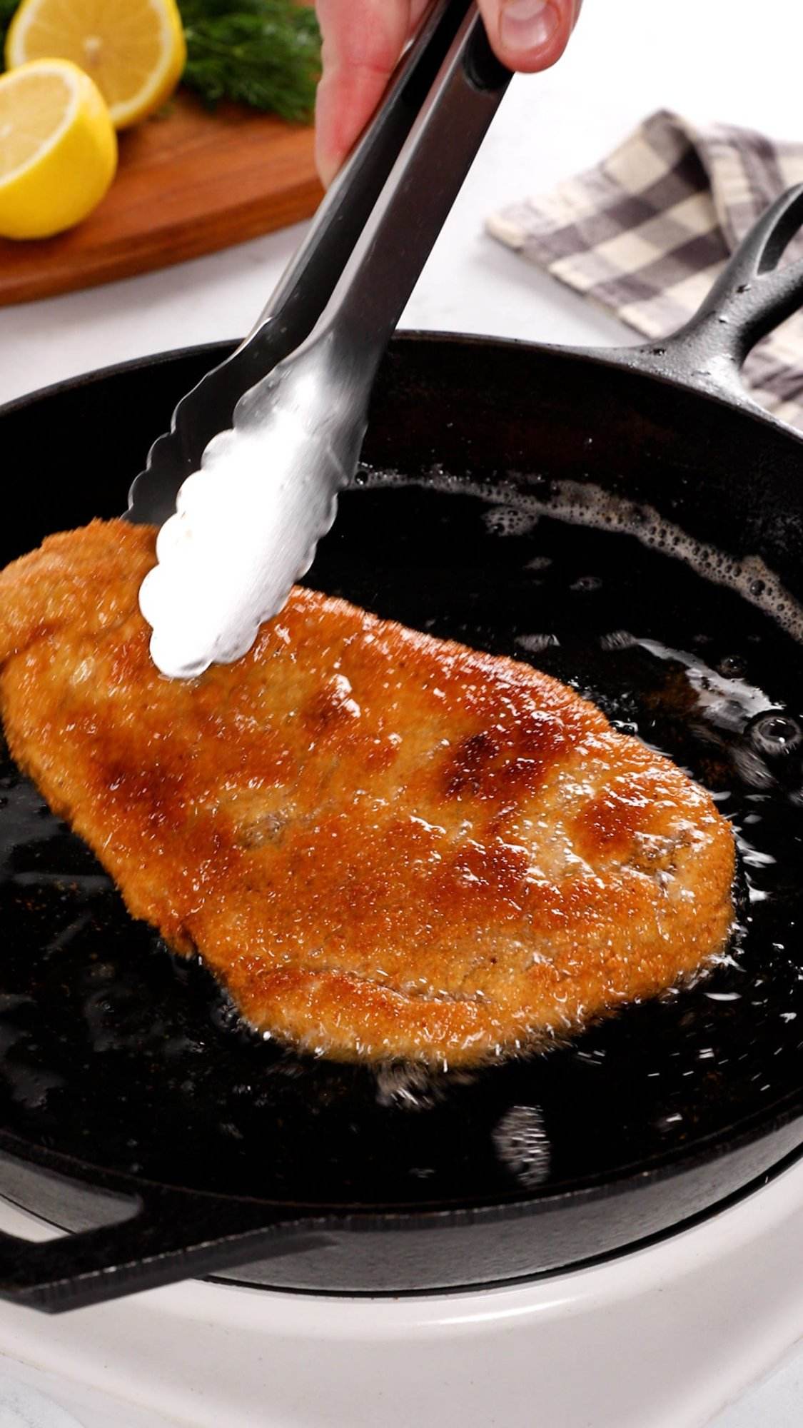 Pan frying pork schnitzel