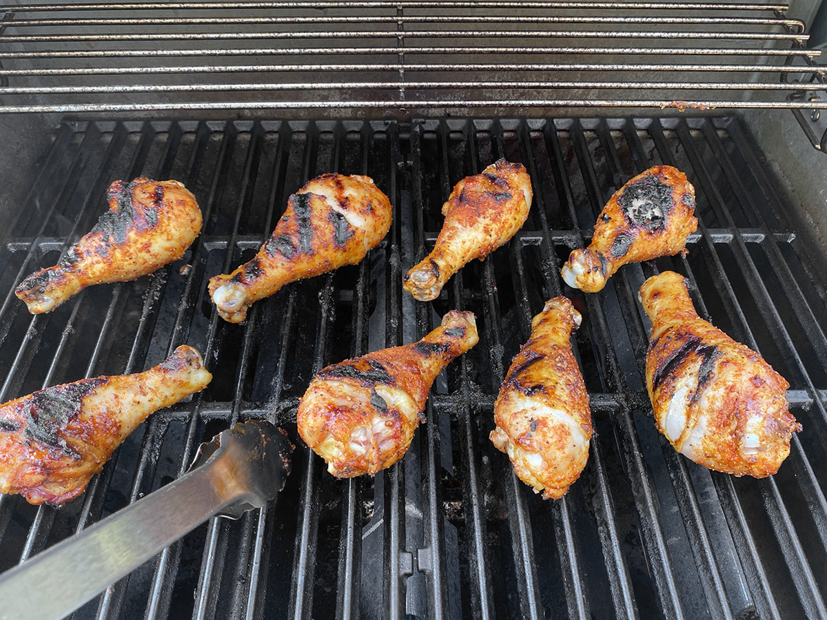 Chicken legs on the grill.