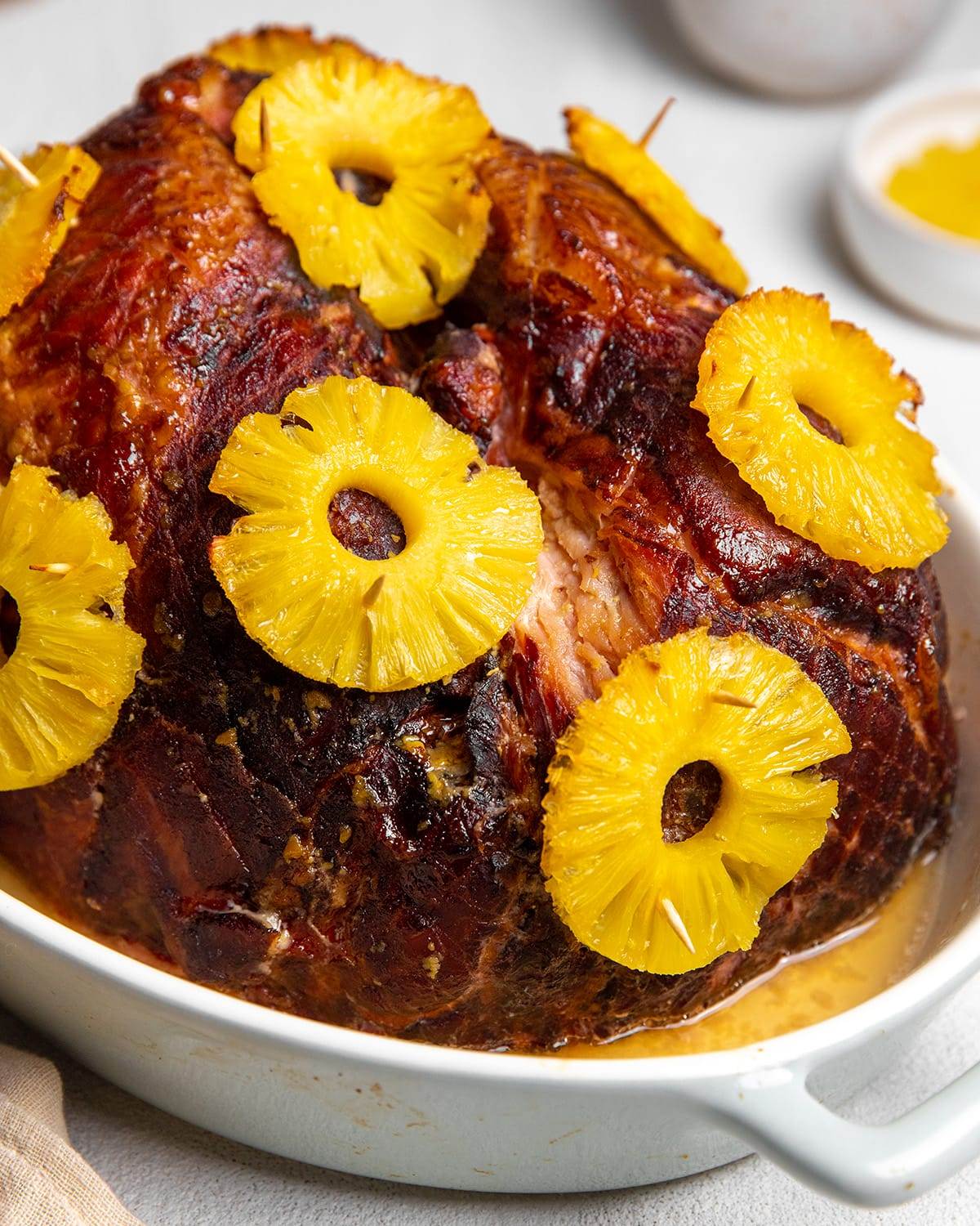 Baked ham with pineapple and a maple and brown sugar glaze right out of the oven.