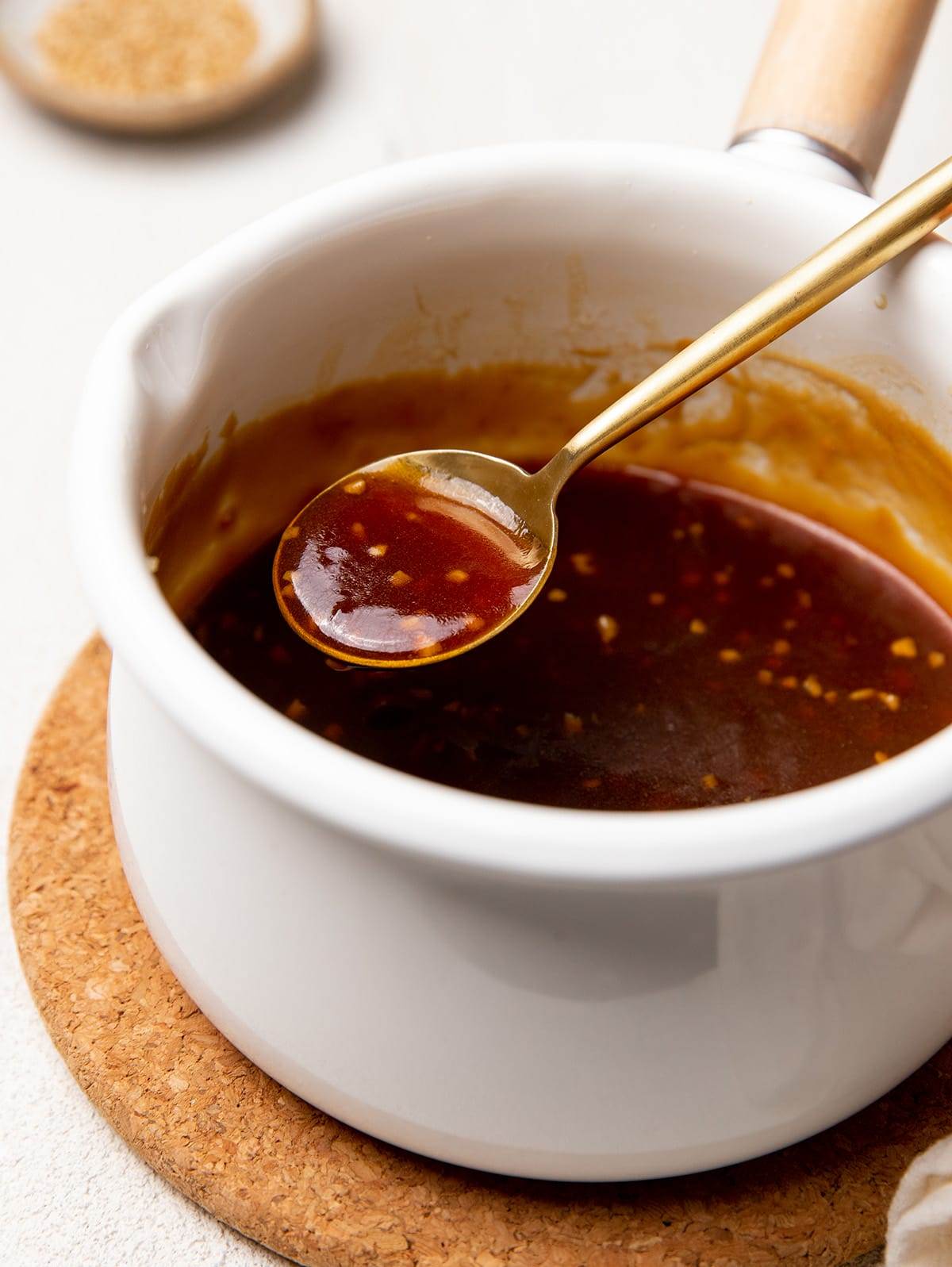A small pot of teriyaki sauce for our air fryer teriyaki salmon recipe.