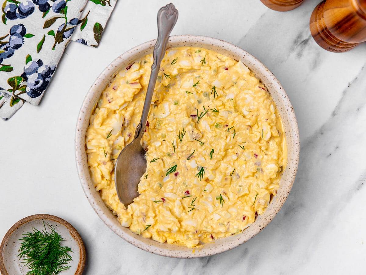 A bowl of fresh made egg salad.