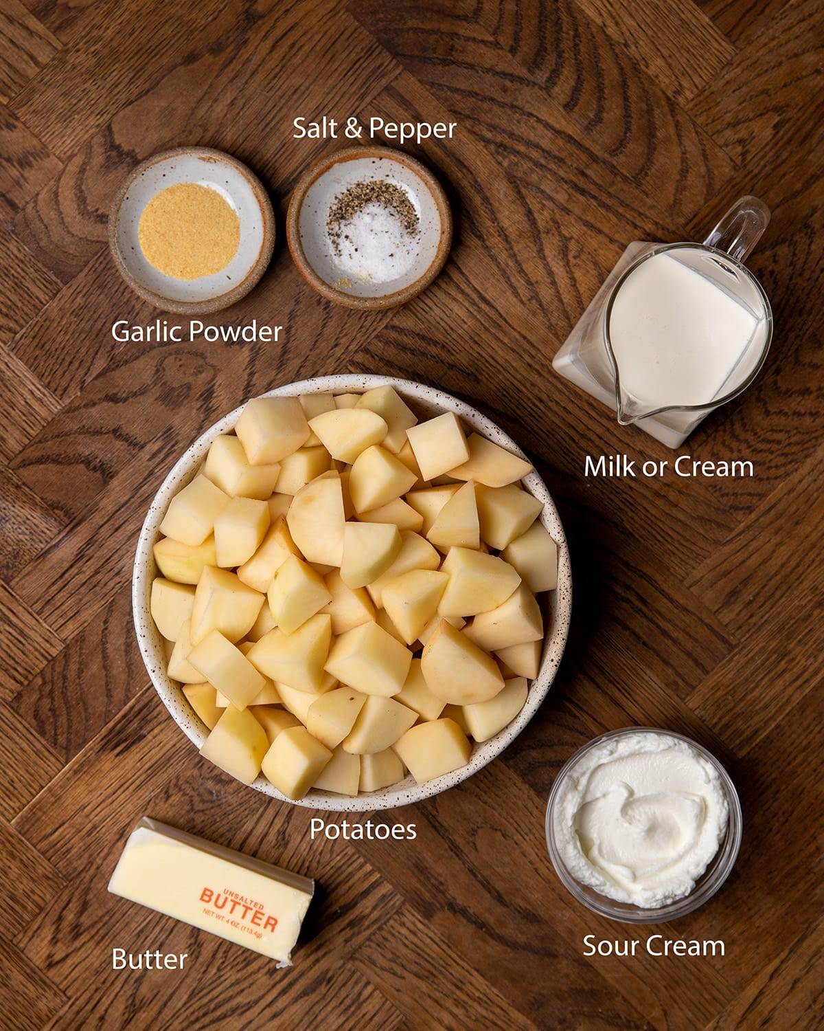 All the ingredients needed to make mashed potatoes.