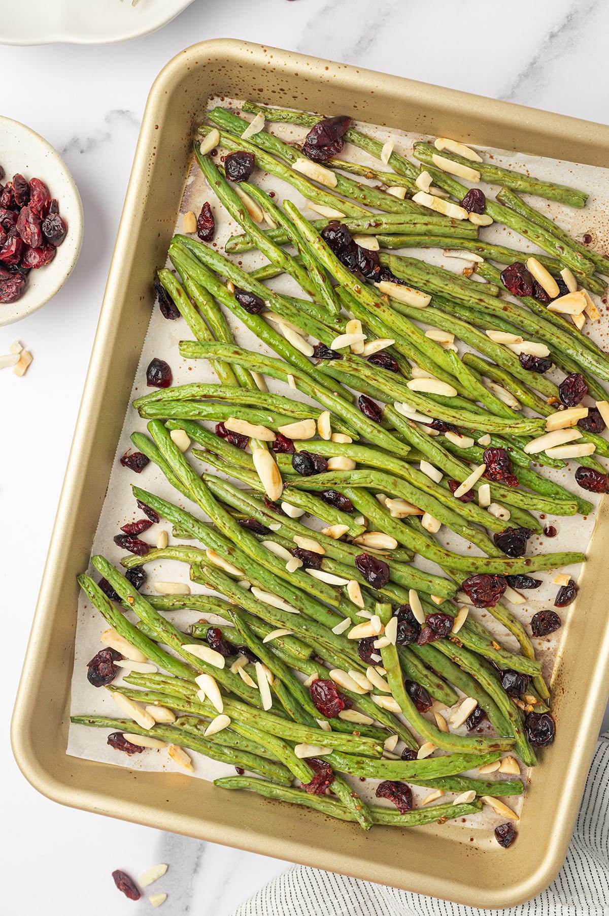 Fresh green beans, dried cranberries, and almonds come together with a sweet honey balsamic glaze.