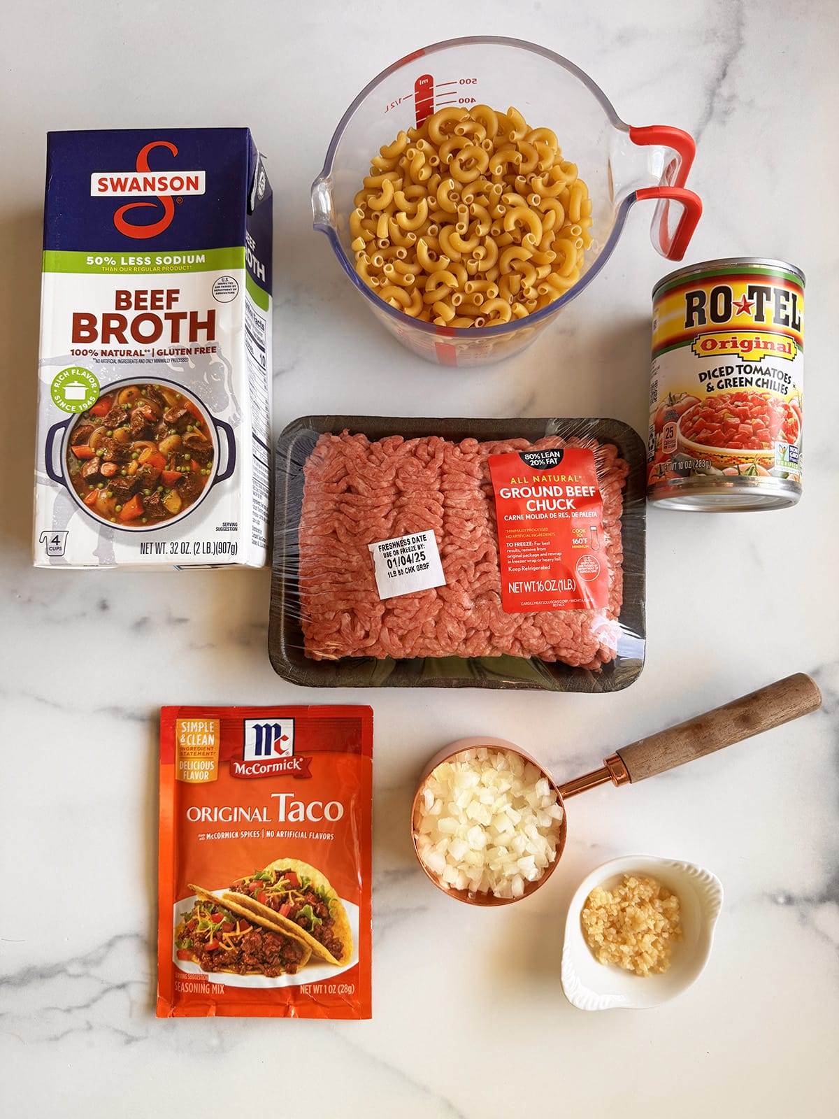 All the ingredients needed to make delicious skillet taco pasta!