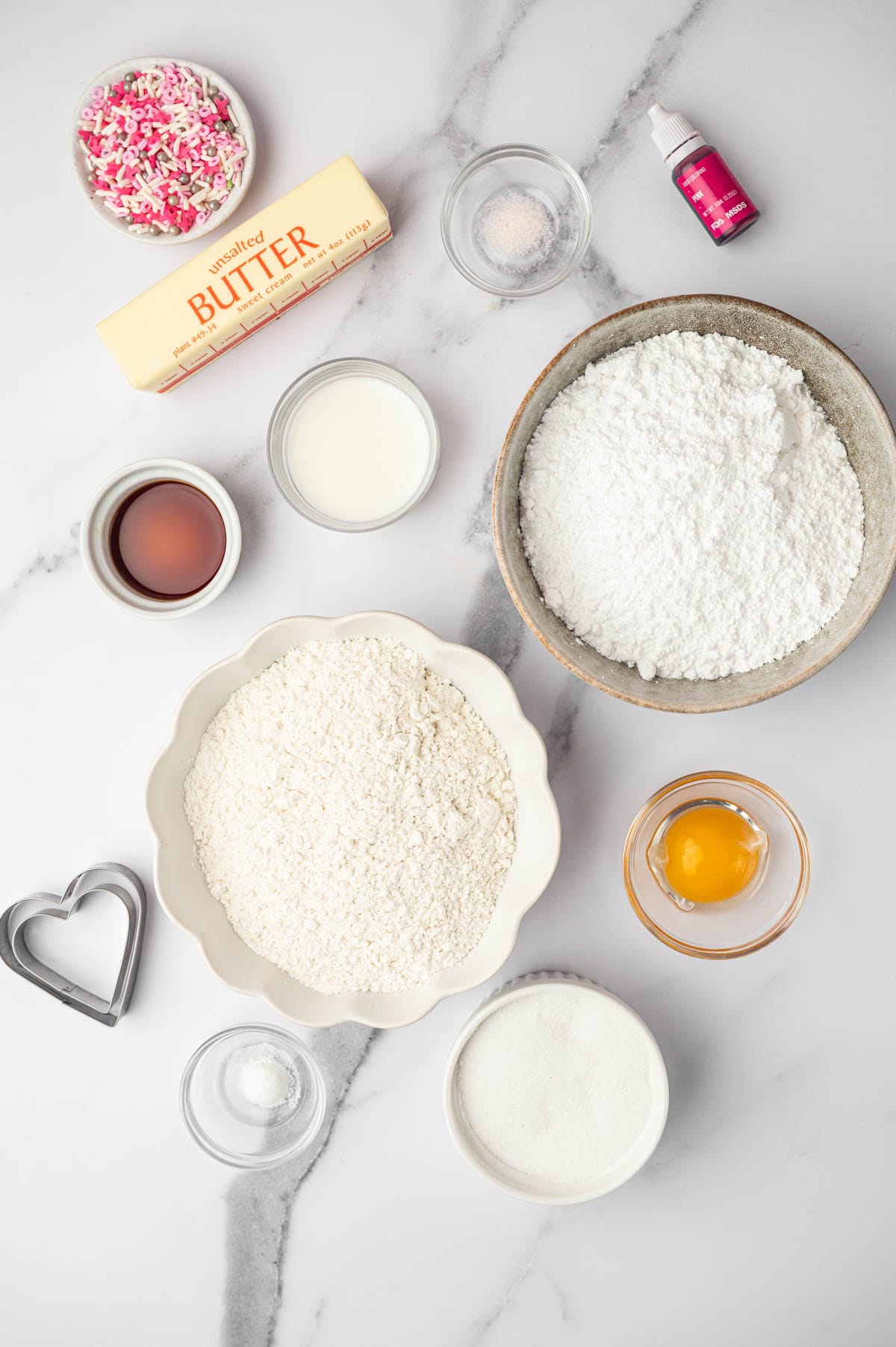 Ingredients for heart-shaped sugar cookies.