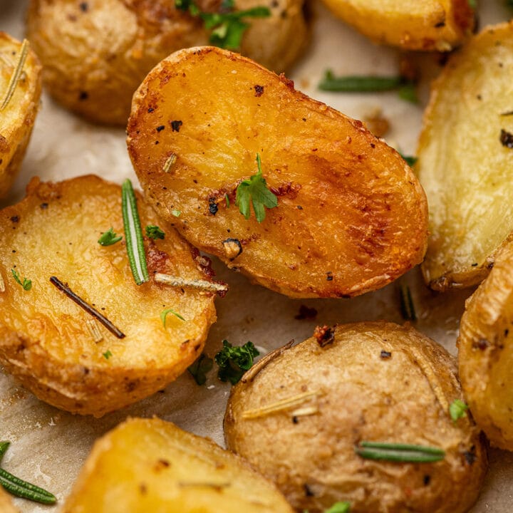 A plate of oven roasted rosemary and garlic potatoes