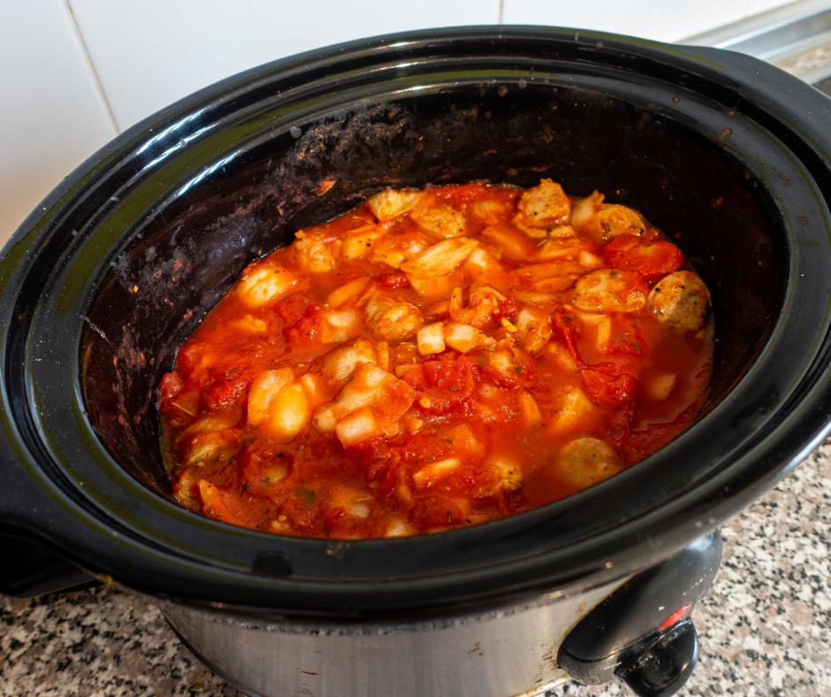 A delicious meal ready to eat inside of a slow cooker.