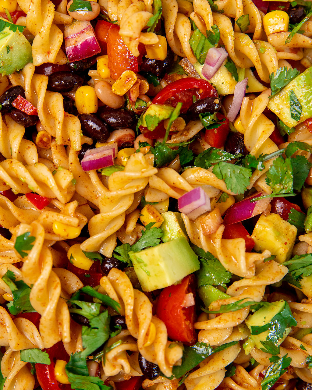 Close-up of fresh and colorful cowboy caviar pasta salad.