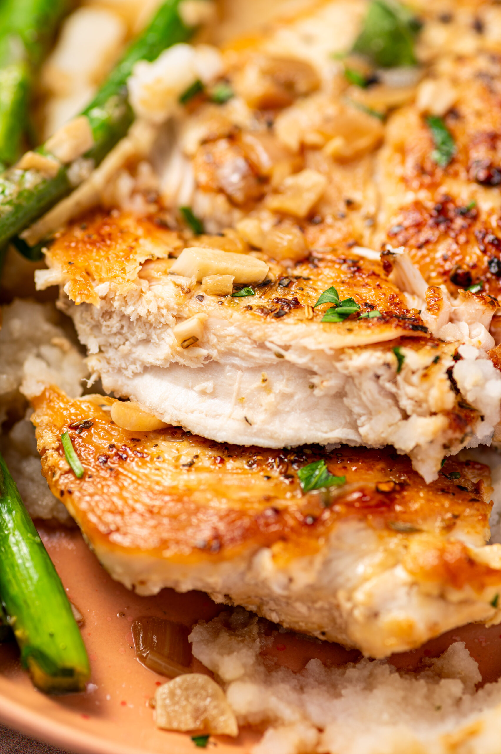 Close-up of perfectly tender lemon herb chicken.
