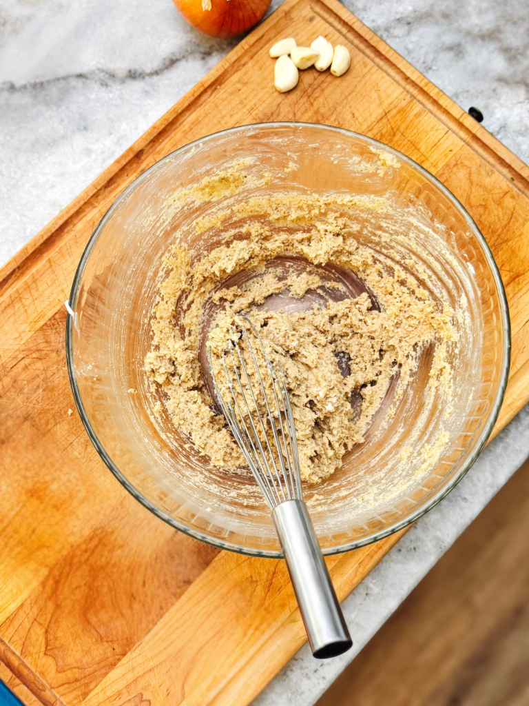 Mixing the breadcrumb mixture for classic meatloaf.