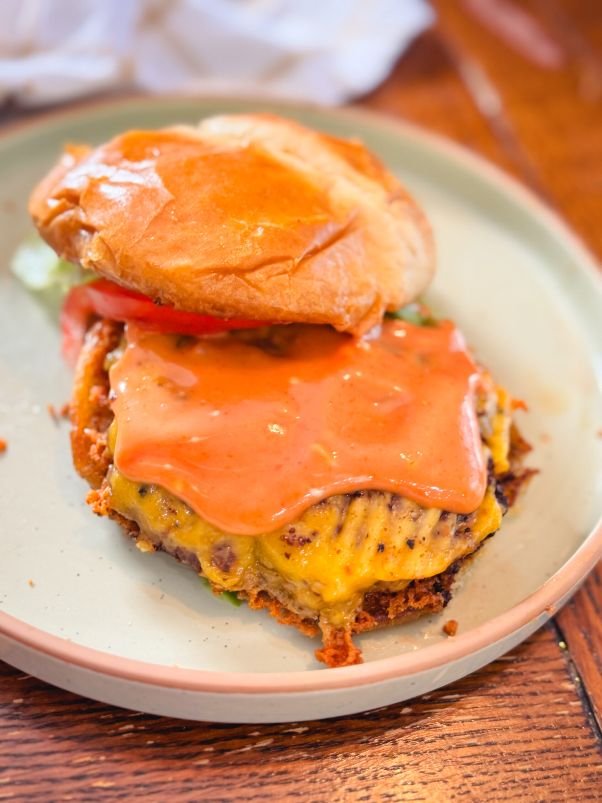 Open faced smash burger with homemade burger sauce.
