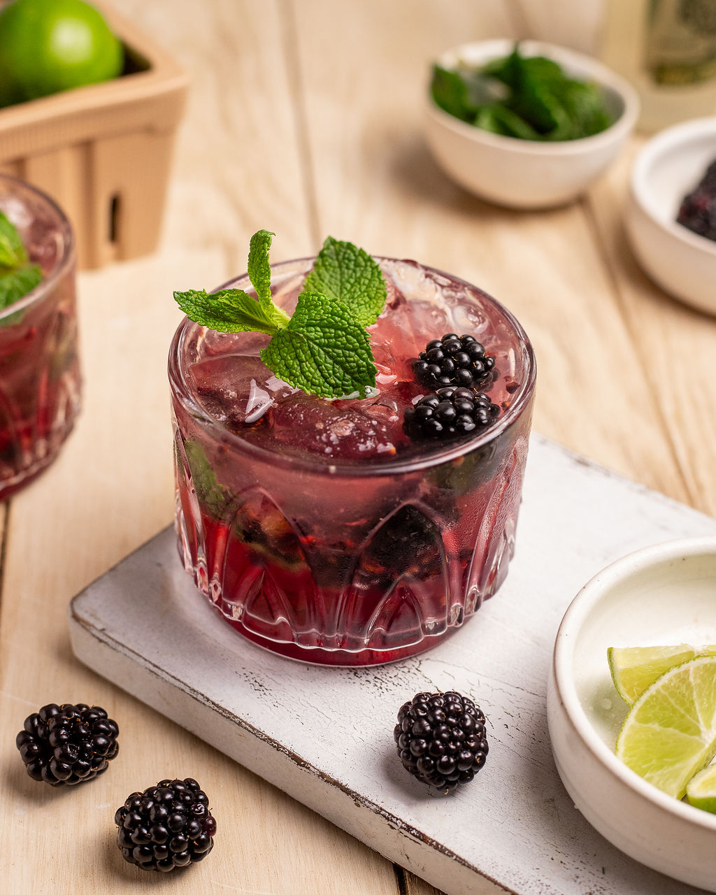 Beautiful blackberry mule mocktail garnished with mint leaves and fresh blackberries.
