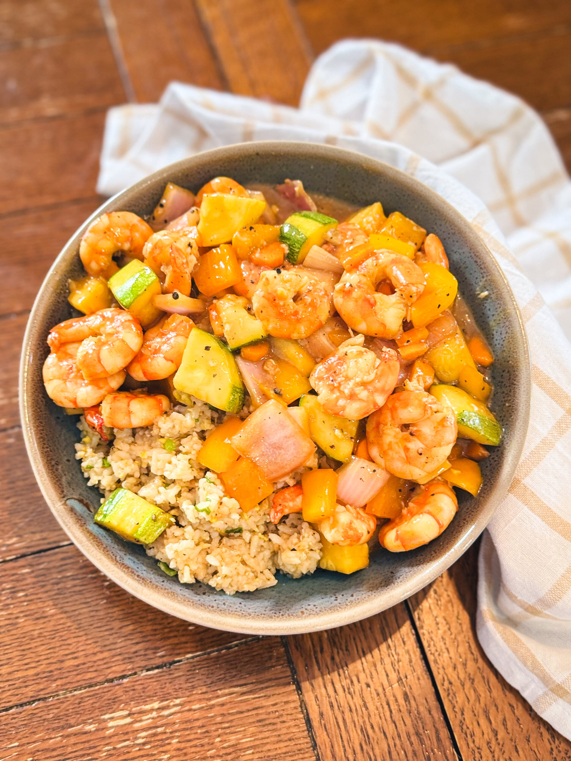 Sheet pan teriyaki shrimp in a bowl.