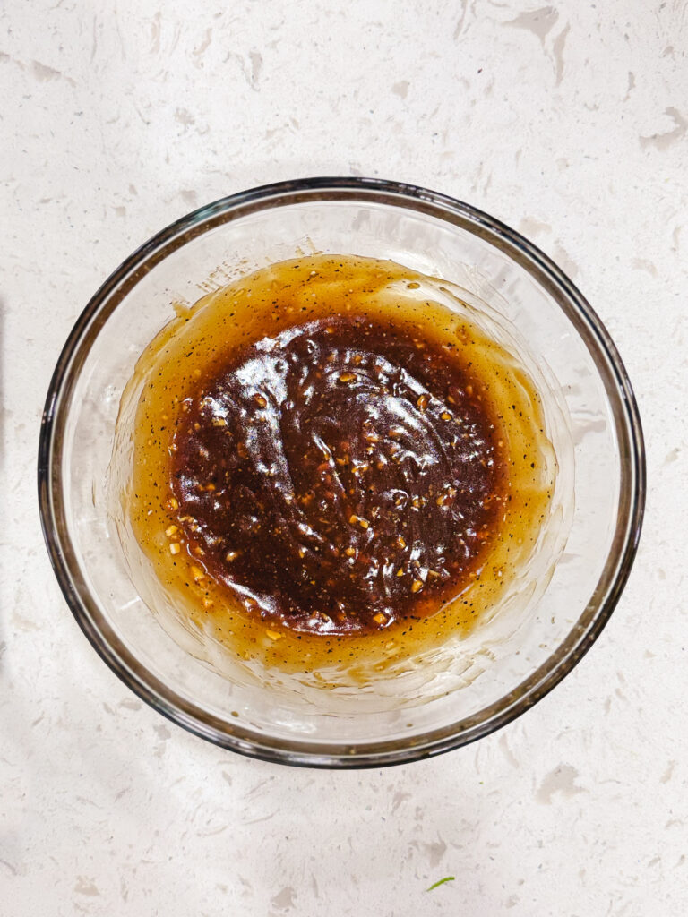 Teriyaki sauce in a glass bowl.