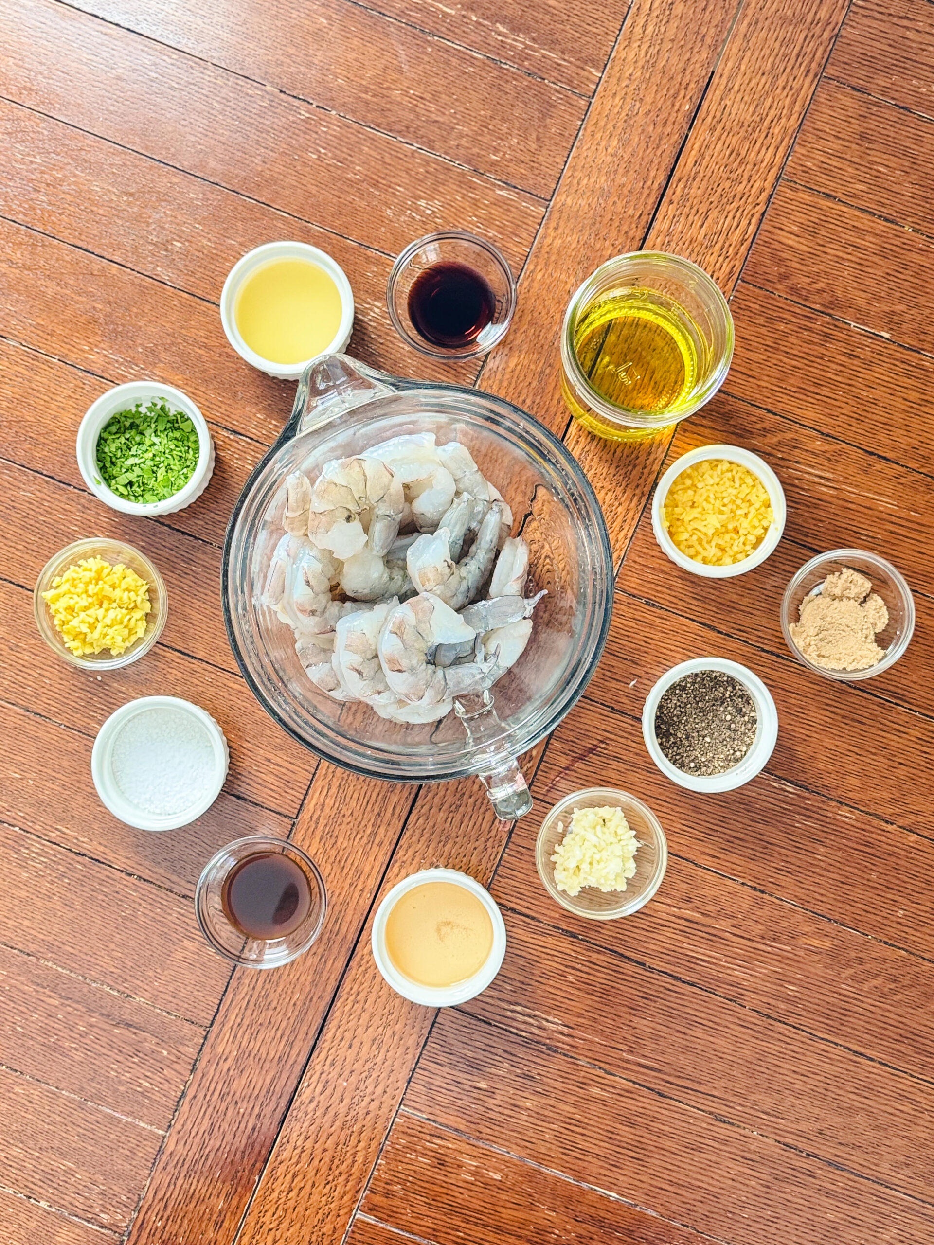 Ingredients for best damn grilled shrimp on a wooden table.