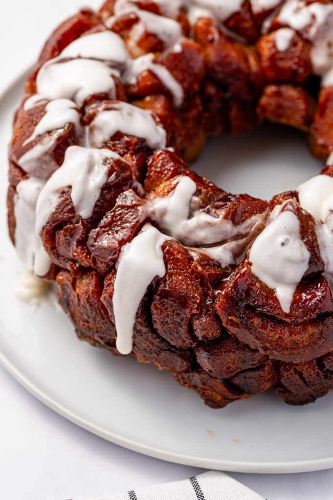 Gooey cinnamon roll monkey bread with icing.
