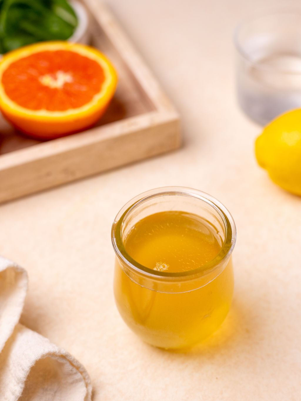 Honey simple syrup in a cute glass.