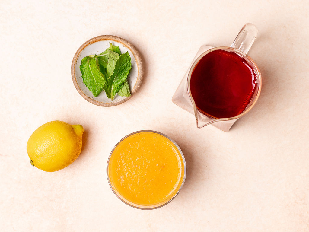 Ingredients to make peach and mint iced tea.