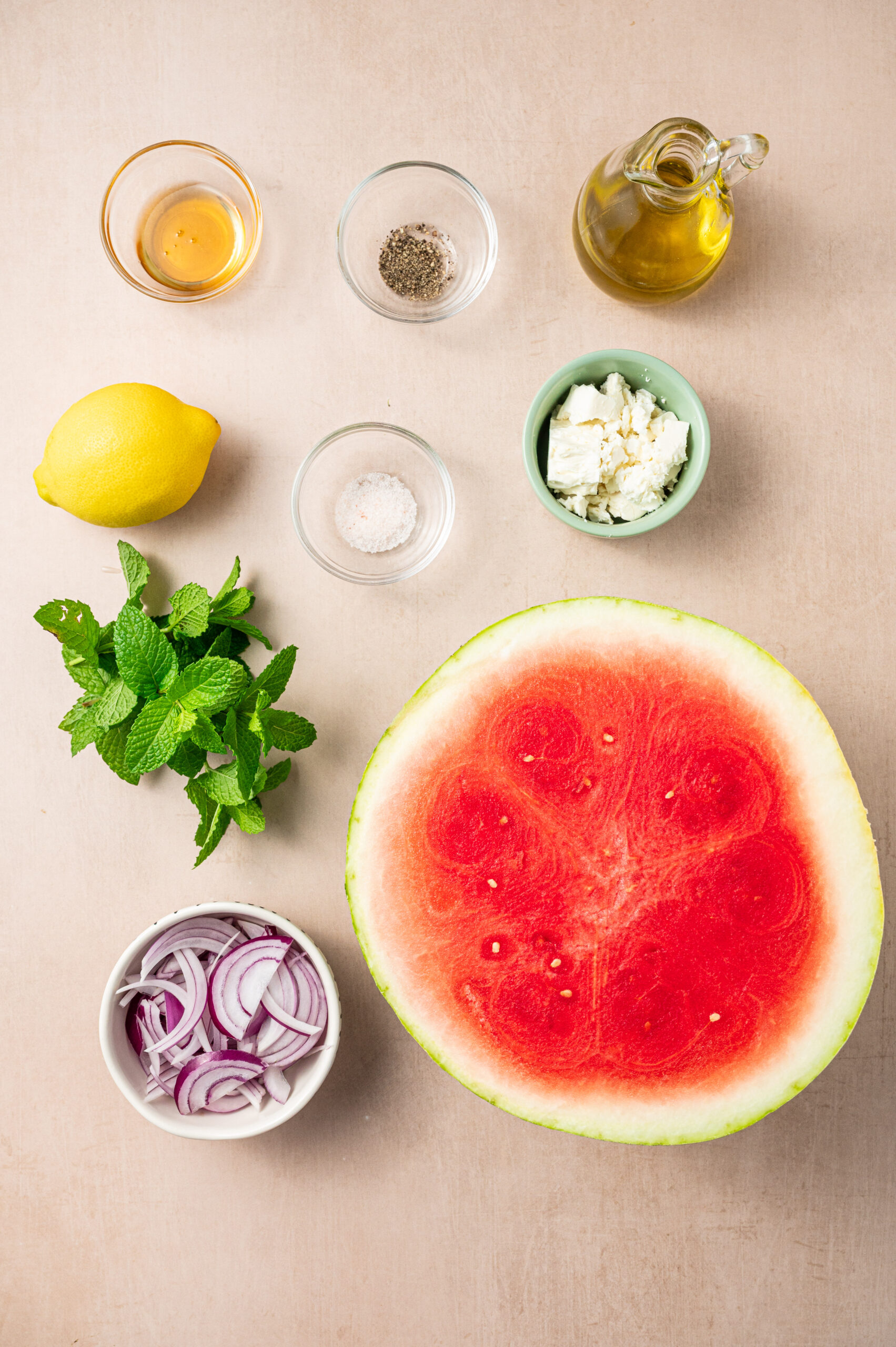 Ingredients for watermelon feta salad on counter top.