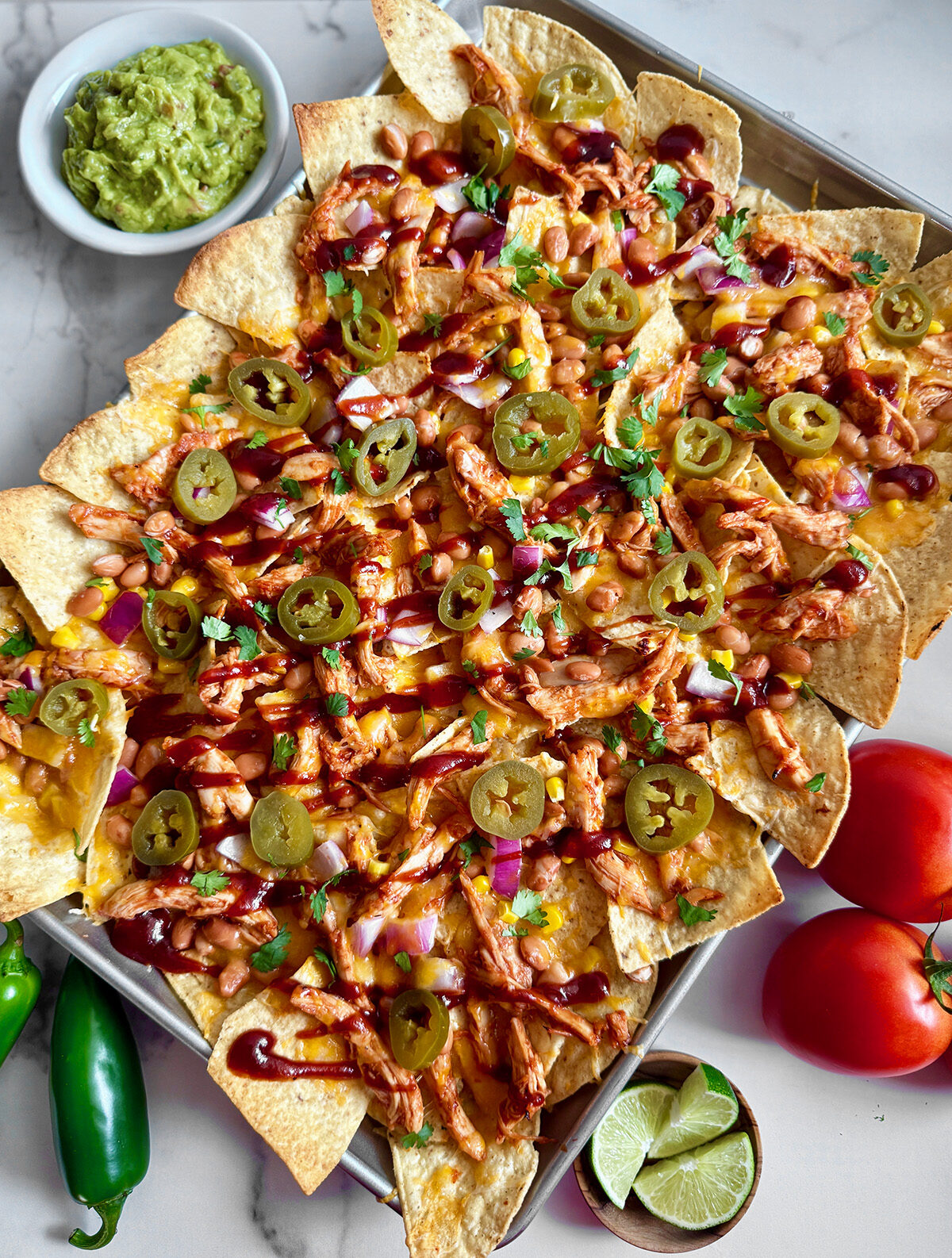 BBQ chicken nachos in a sheet pan, one of the easiest low-prep chicken recipes.