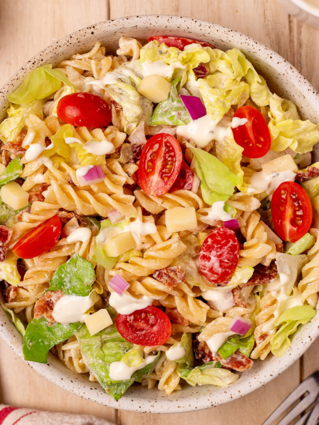 A white bowl of BLT pasta salad.