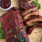 Make the most delicious, fall-off-the-bone BBQ baby back ribs in your slow cooker with our easy recipe!