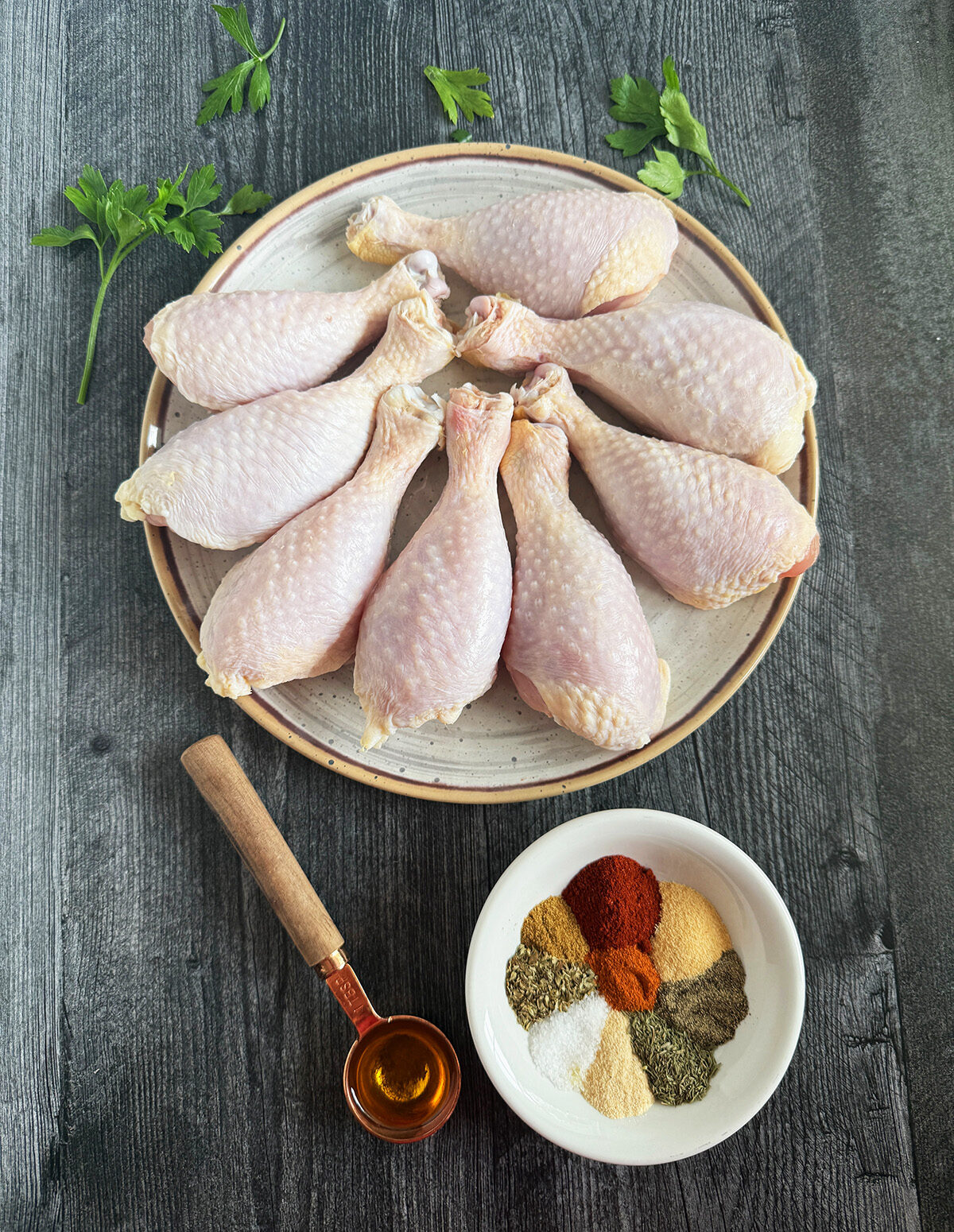 All the ingredients needed to make RecipeTeacher's oven baked  cajun chicken drumsticks.